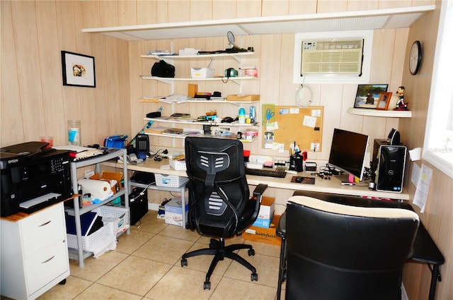 office area featuring a wall mounted AC, wood walls, and light tile floors