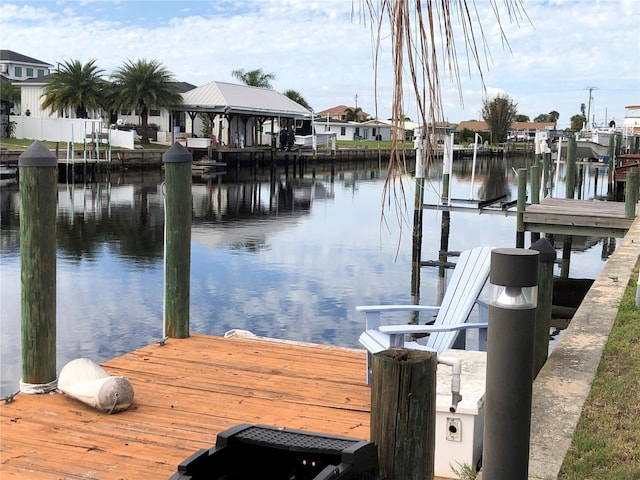 dock area featuring a water view