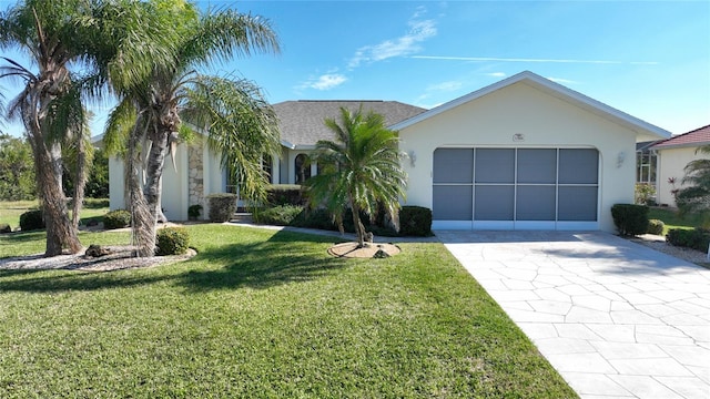 ranch-style home with a front lawn and a garage