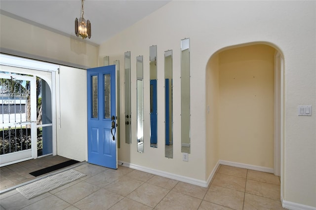 entrance foyer featuring light tile floors