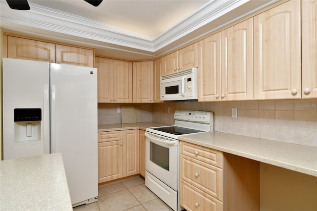 kitchen featuring white appliances, light brown cabinets, tasteful backsplash, and ceiling fan