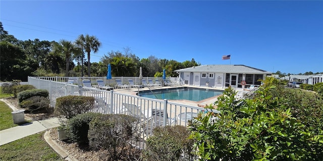 view of swimming pool featuring a patio