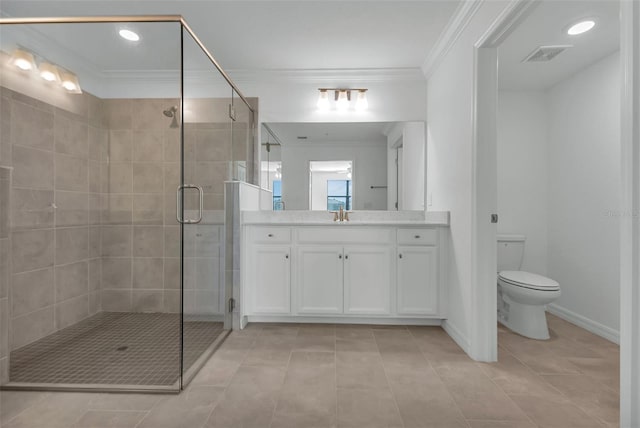 bathroom with vanity, an enclosed shower, toilet, crown molding, and tile patterned floors