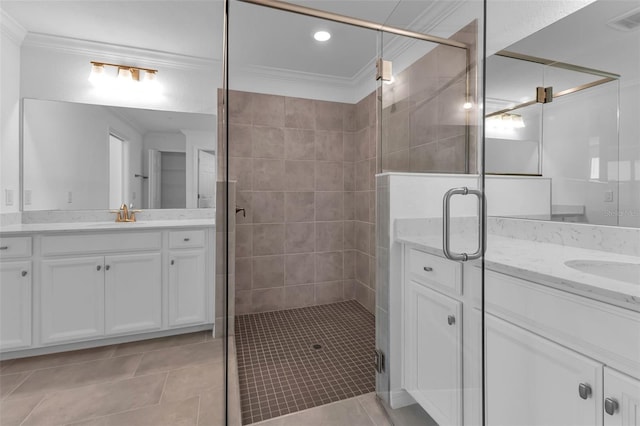 bathroom featuring an enclosed shower, vanity, and ornamental molding