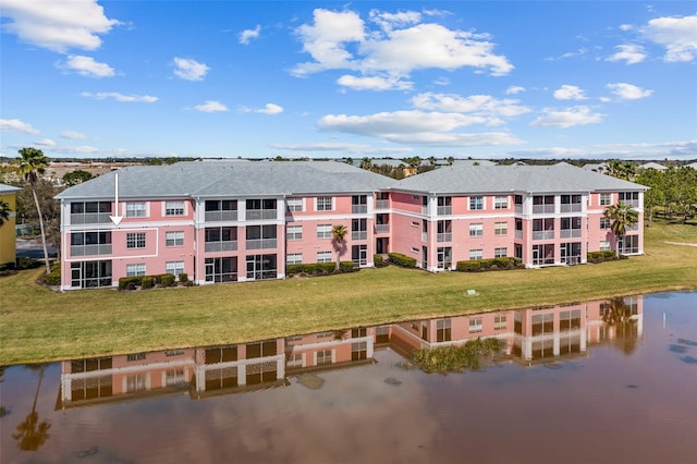 view of property with a water view