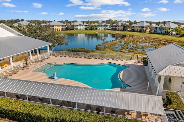 view of pool with a water view