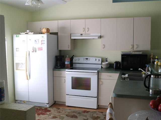 kitchen featuring light hardwood / wood-style floors, white appliances, ceiling fan, and sink