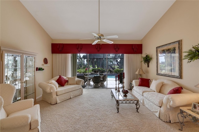 living room with carpet floors, high vaulted ceiling, and ceiling fan