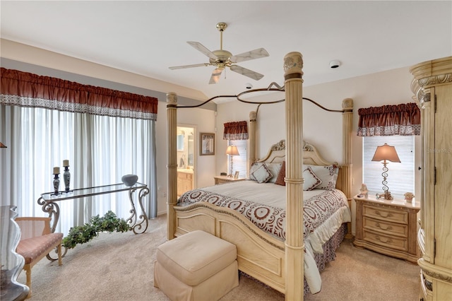 bedroom with multiple windows, light carpet, and ceiling fan