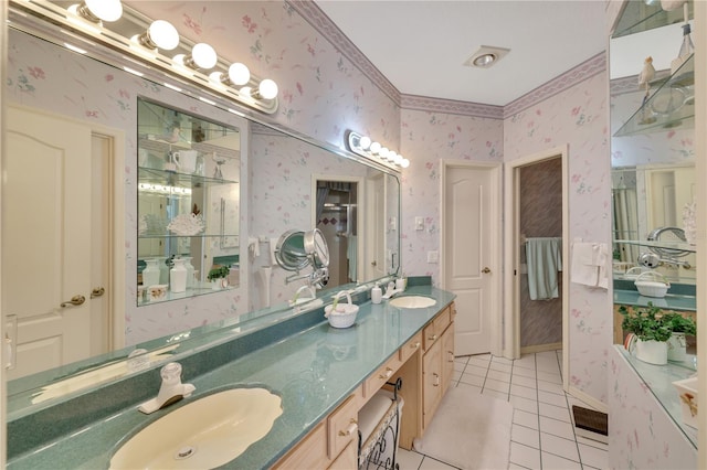 bathroom with vanity, tile patterned floors, and ornamental molding