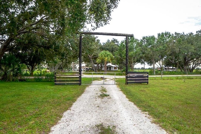 view of home's community featuring a yard