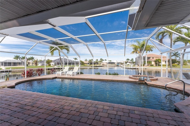 view of pool featuring a lanai, a water view, an in ground hot tub, and a patio