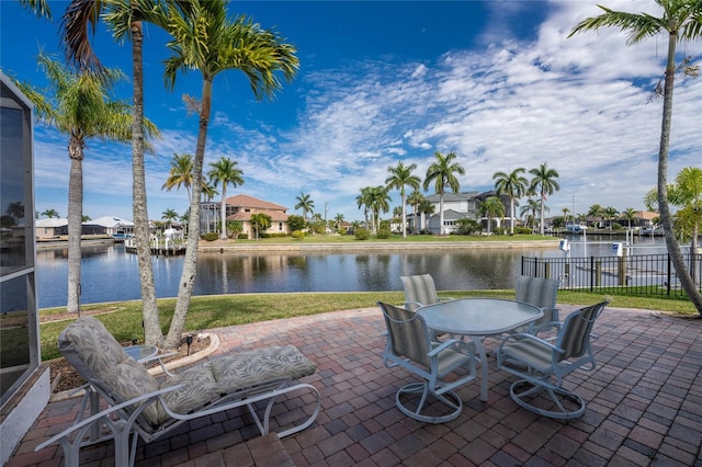 view of patio / terrace with a water view