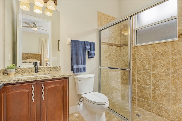 bathroom featuring walk in shower, toilet, ceiling fan, tile floors, and vanity