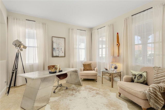 sitting room with a healthy amount of sunlight