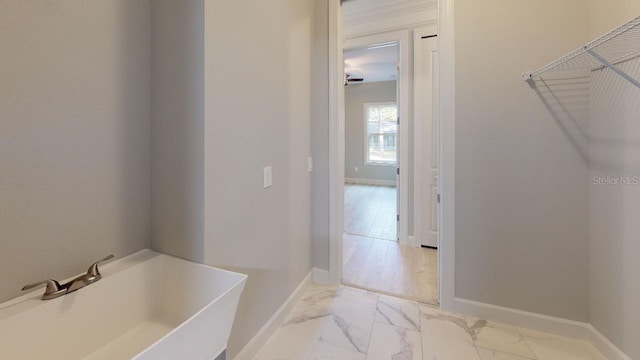 bathroom with sink and a bathtub