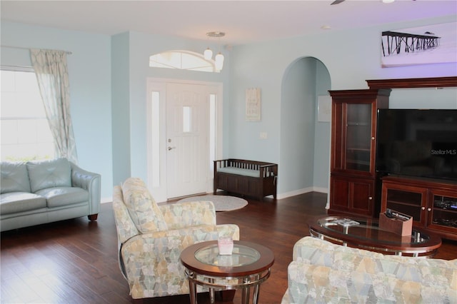 living room with dark hardwood / wood-style floors