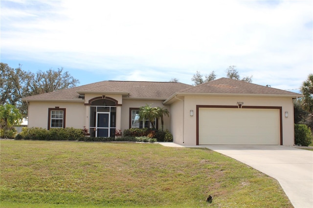 ranch-style house featuring a front yard and a garage