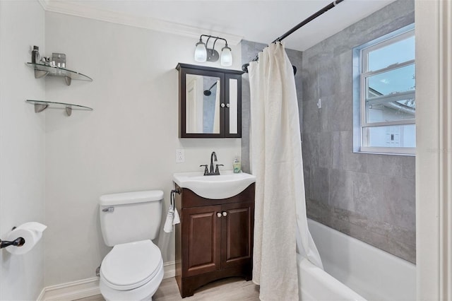 full bathroom featuring vanity, hardwood / wood-style flooring, toilet, shower / bathtub combination with curtain, and ornamental molding