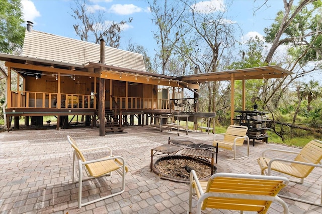 view of patio / terrace with a sunroom