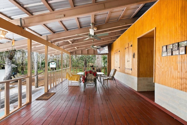 wooden deck with ceiling fan