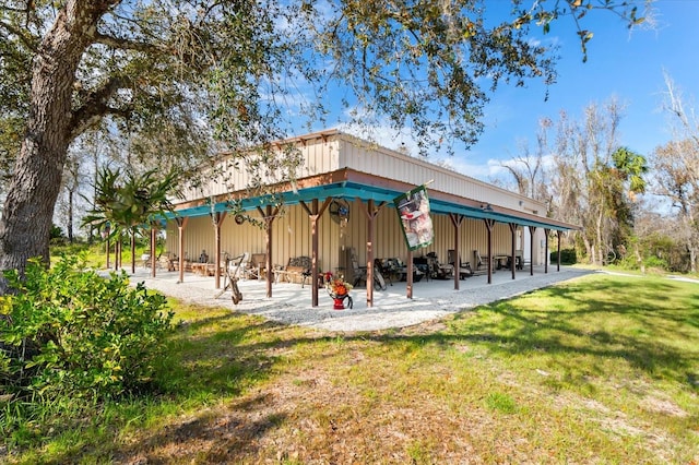 view of community featuring a lawn