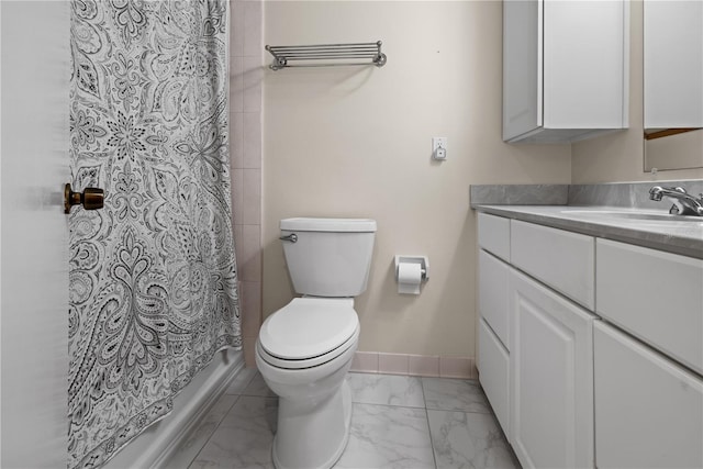 bathroom featuring toilet, tile flooring, and large vanity