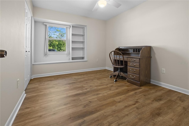 office featuring hardwood / wood-style floors and ceiling fan