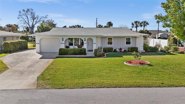 ranch-style home with a front lawn and a garage