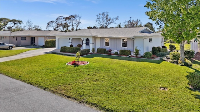 ranch-style home featuring a front yard