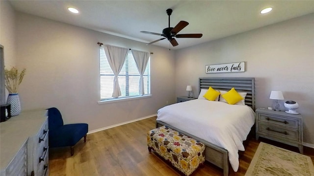 bedroom featuring ceiling fan and dark wood-type flooring