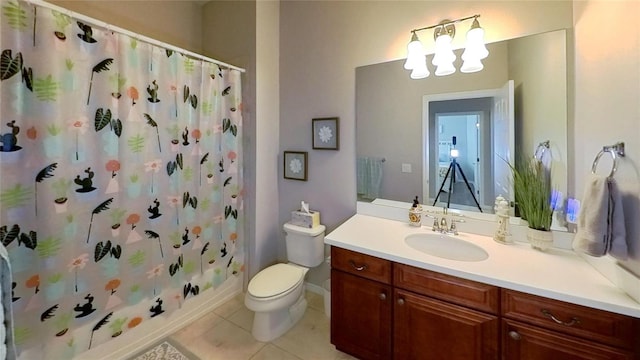 bathroom featuring tile flooring, a chandelier, large vanity, and toilet