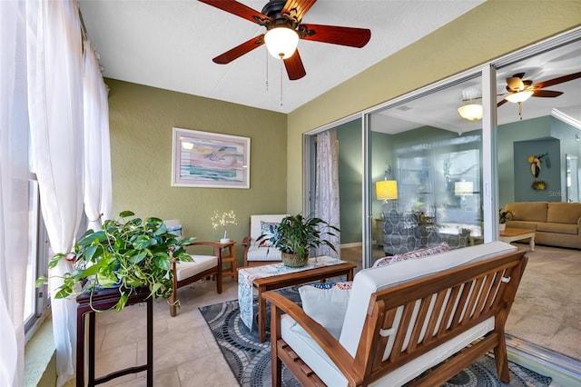 interior space featuring ceiling fan