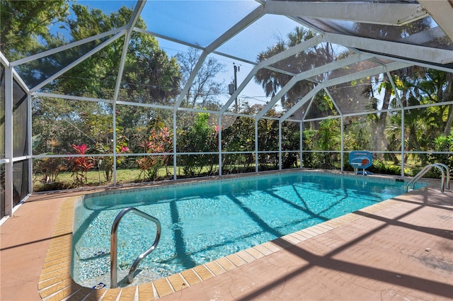 view of pool featuring a patio and a lanai