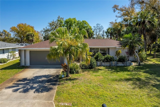 ranch-style house with a garage and a front yard