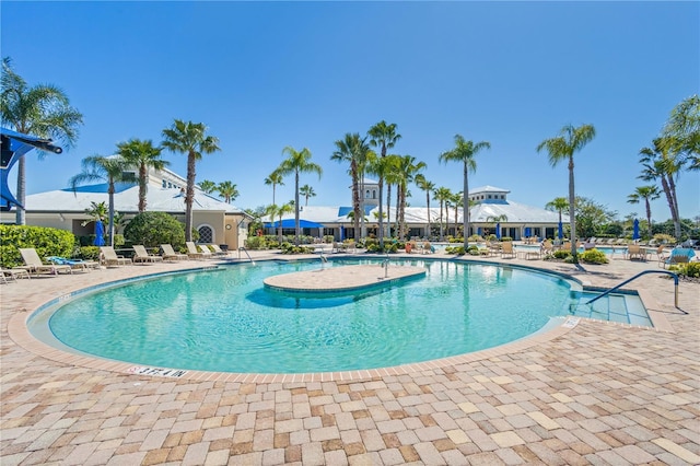 view of pool featuring a patio