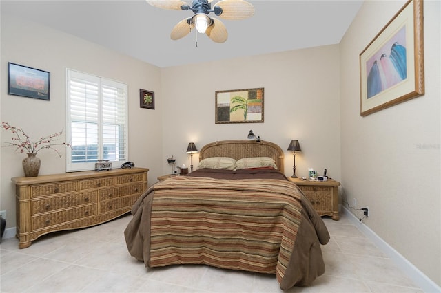 tiled bedroom featuring ceiling fan