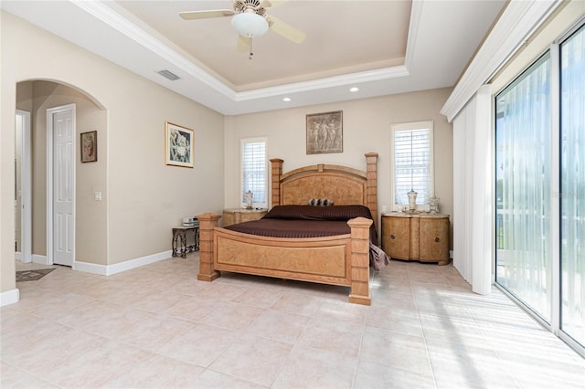 bedroom with access to outside, light tile flooring, ceiling fan, and a tray ceiling