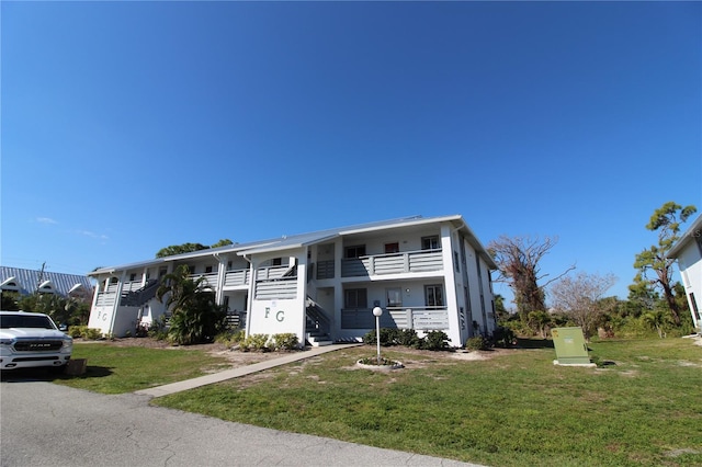 view of front of home with a front yard