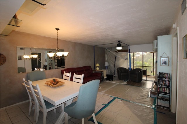 tiled dining area with a notable chandelier