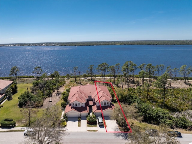 drone / aerial view featuring a water view