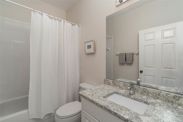 full bathroom featuring shower / bathtub combination with curtain, vanity, and toilet