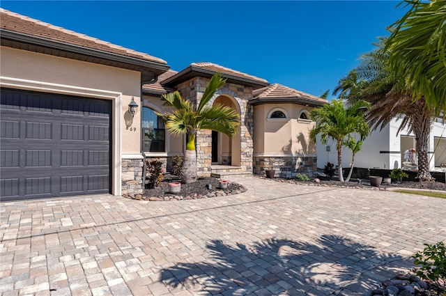 view of front of home with a garage