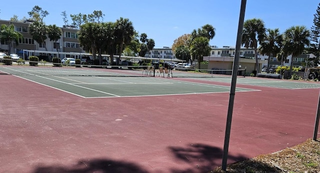 view of tennis court with basketball court