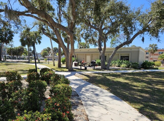 21280 Brinson Ave Unit 205, Port Charlotte, FL 33952 - view of home's community with a yard