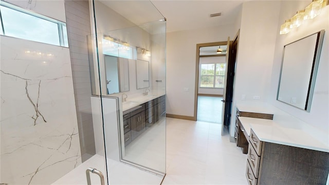 bathroom featuring tile floors and vanity