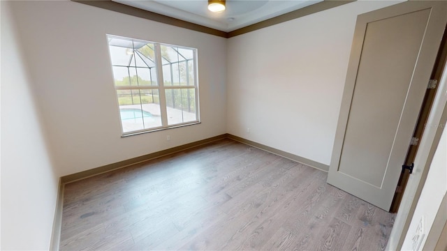 unfurnished room with light hardwood / wood-style floors