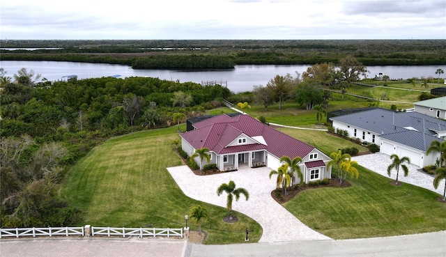 drone / aerial view with a water view