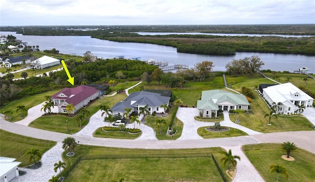 birds eye view of property featuring a water view