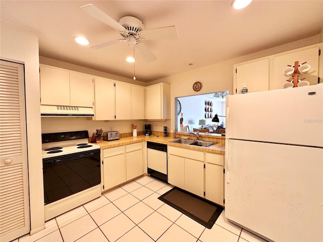 kitchen featuring white appliances, light tile patterned floors, sink, ceiling fan, and white cabinets